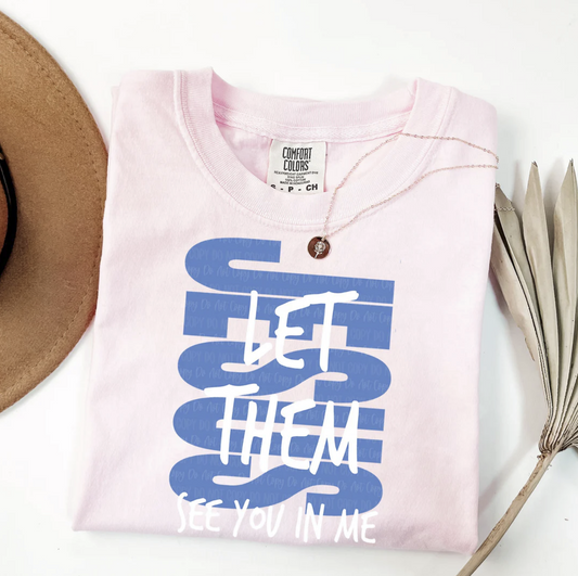 Light pink Let Them See You in Me t-shirt – Christian Comfort Colors tee
 Faith-based graphic shirt with stacked lettering design
Religious tee for church, Bible study, and everyday wear
