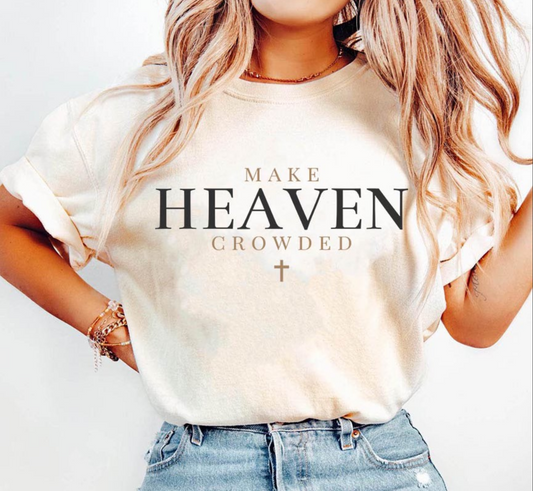 Woman wearing beige Make Heaven Crowded t-shirt with bold faith typography
Christian evangelism inspired graphic tee with cross design
Religious t-shirt for church, Bible study, and outreach events