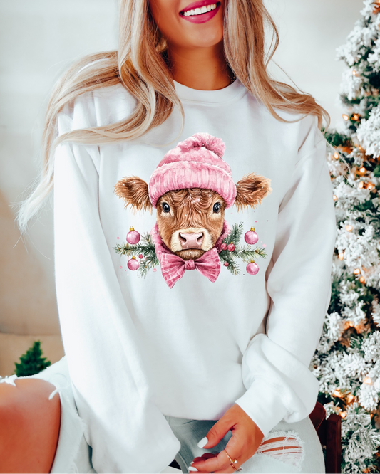 Christmas cow sweatshirt with pink beanie and bow
Cute holiday farm animal sweatshirt white crewneck
Rustic farmhouse Christmas sweatshirt unisex