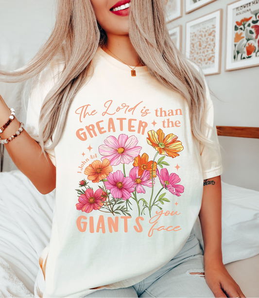 The Lord Is Greater Than the Giants You Face Christian Graphic Tee & Sweatshirt with floral illustration