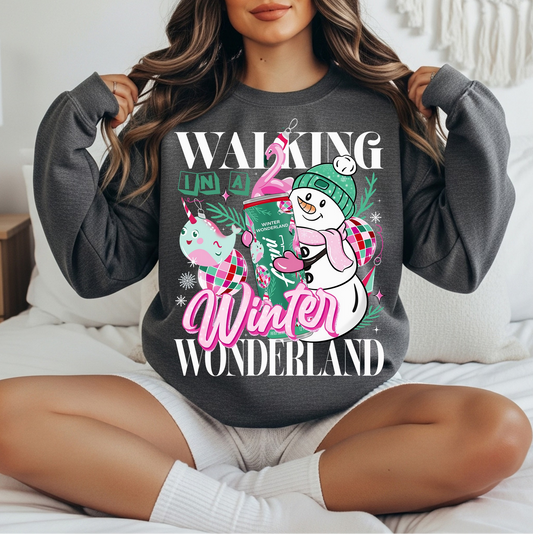 Walking in a Winter Wonderland sweatshirt with snowman graphic
Cozy winter crewneck with pink and white holiday design
Cute Christmas sweatshirt perfect for winter outfits