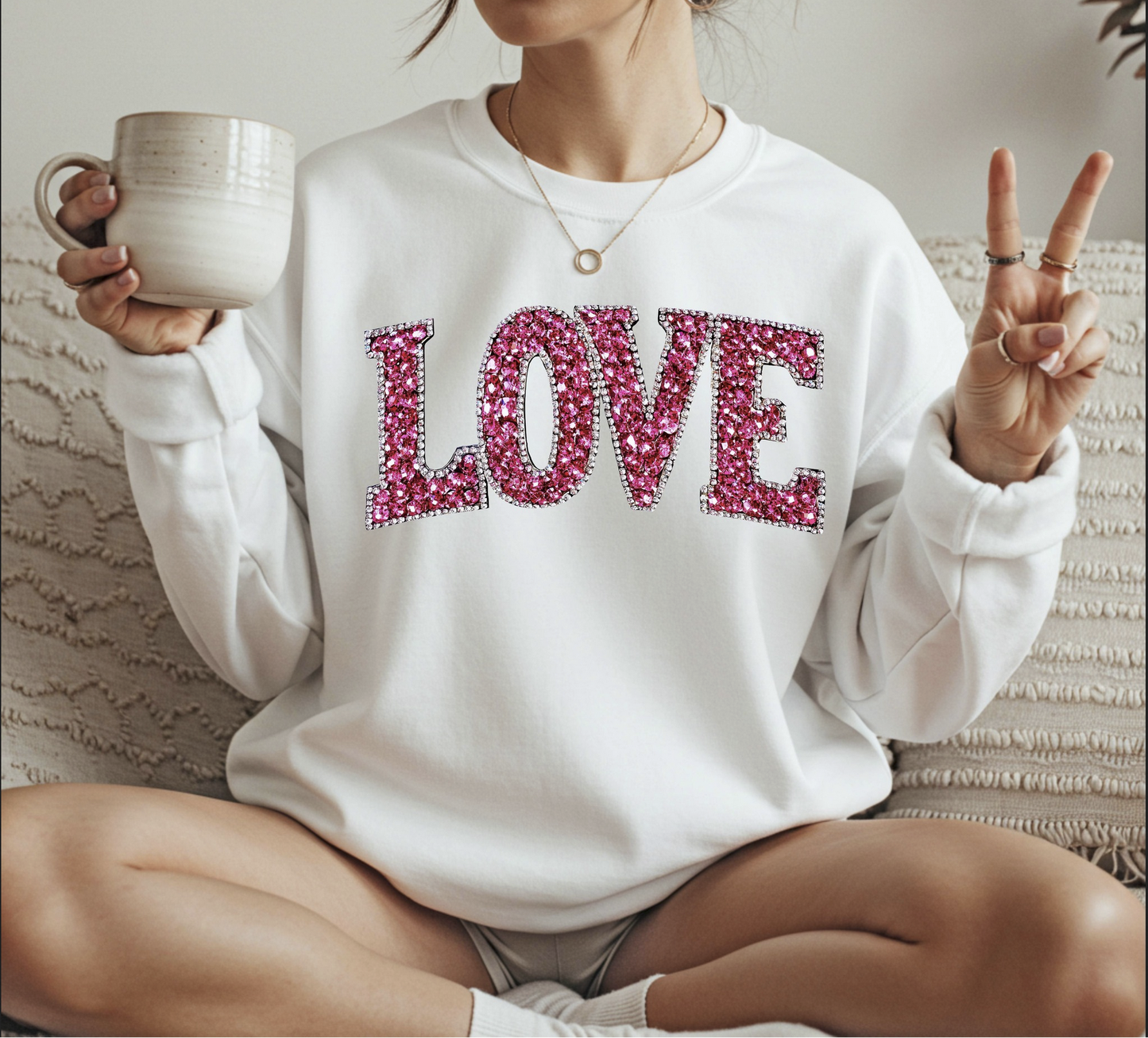 LOVE sparkle sweatshirt with glitter-style pink lettering
Valentine LOVE graphic crewneck styled casually
Love themed sweatshirt perfect for Valentine’s Day outfits

