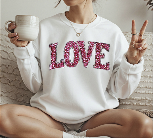 LOVE sparkle sweatshirt with glitter-style pink lettering
Valentine LOVE graphic crewneck styled casually
Love themed sweatshirt perfect for Valentine’s Day outfits
