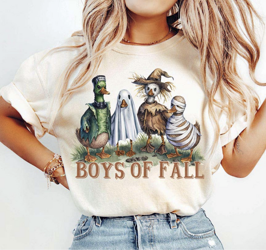 "Beige graphic tee with ducks dressed in fall costumes – Boys of Fall shirt"

"Cute autumn t-shirt with scarecrow, mummy, and ghost ducks"