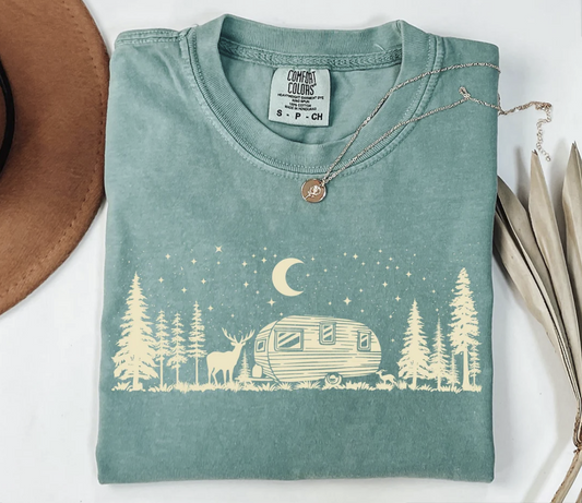 Green t-shirt with camper, pine trees, deer, moon, and stars graphic – outdoors camping adventure tee