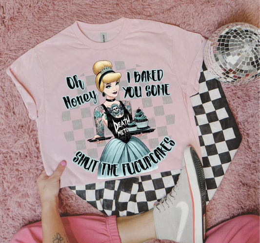 Funny Shut the Cupcakes graphic tee with tattooed princess and goth cupcakes on pink shirt
