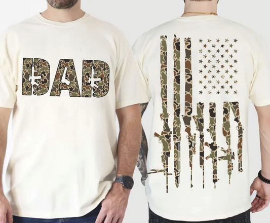 Cream Camo Dad American Flag t-shirt with “DAD” camo print on front and distressed camouflage American flag design on back, modeled by men.