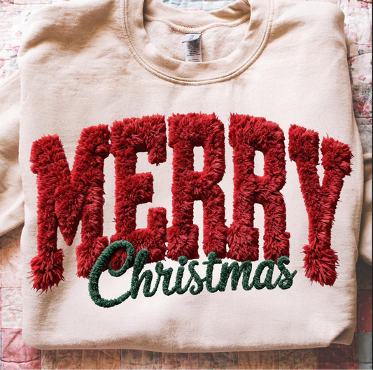 Cream sweatshirt with red “MERRY” and green “Christmas” chenille-style letters

Cozy holiday sweatshirt folded on quilted background

Textured Christmas crewneck perfect for winter season

Festive unisex sweatshirt with raised lettering design