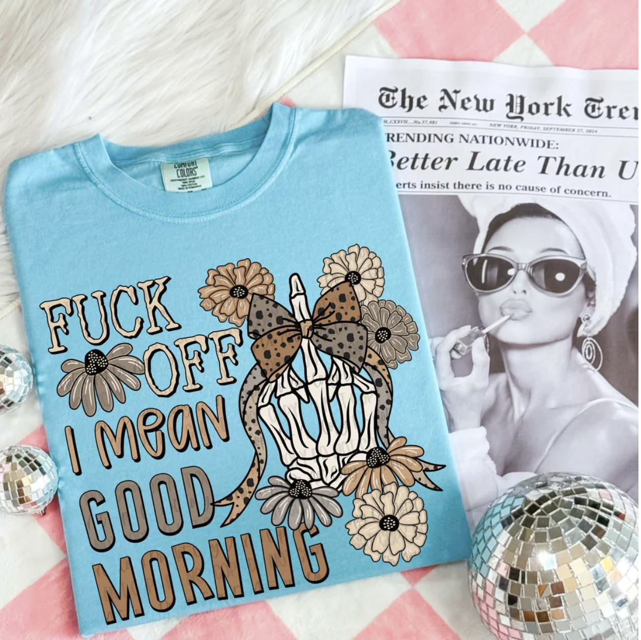 "Light blue funny graphic tee with floral design – F*ck Off I Mean Good Morning shirt"

"Sarcastic unisex t-shirt with retro floral artwork and bold funny text"
