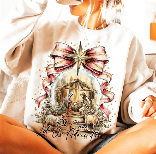 Woman wearing “Oh Come Let Us Adore Him” Christmas sweatshirt with nativity scene

Faith-based Christmas crewneck with gold star and ribbon design

Cozy winter sweatshirt featuring Jesus birth scene

Ivory Christian sweatshirt — perfect for Christmas gift
