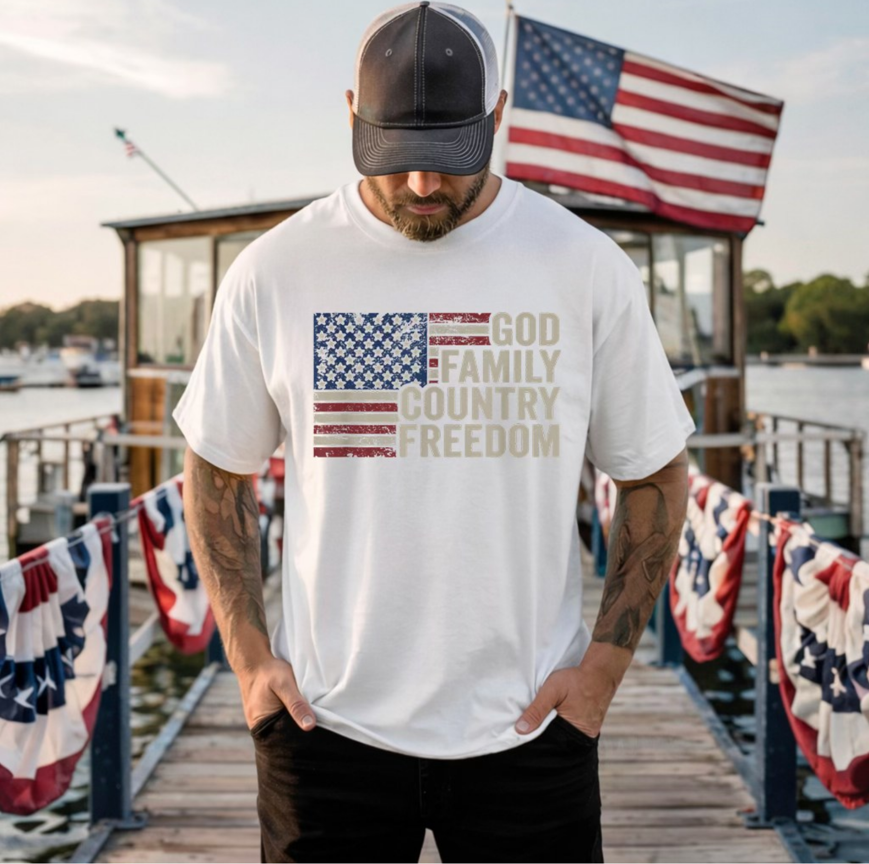 White t-shirt with distressed American flag graphic and text “God Family Country Freedom”