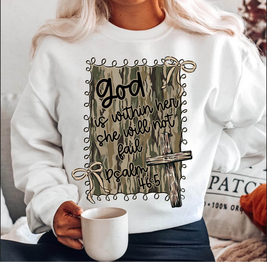 White sweatshirt with camo-style Psalm 46:5 graphic “God is within her, she will not fail.”

Close-up of Christian scripture sweatshirt with rustic camo panel.

Woman wearing camo Christian crewneck with inspirational Bible verse.

Faith-based sweatshirt styled for cozy indoor winter outfit.