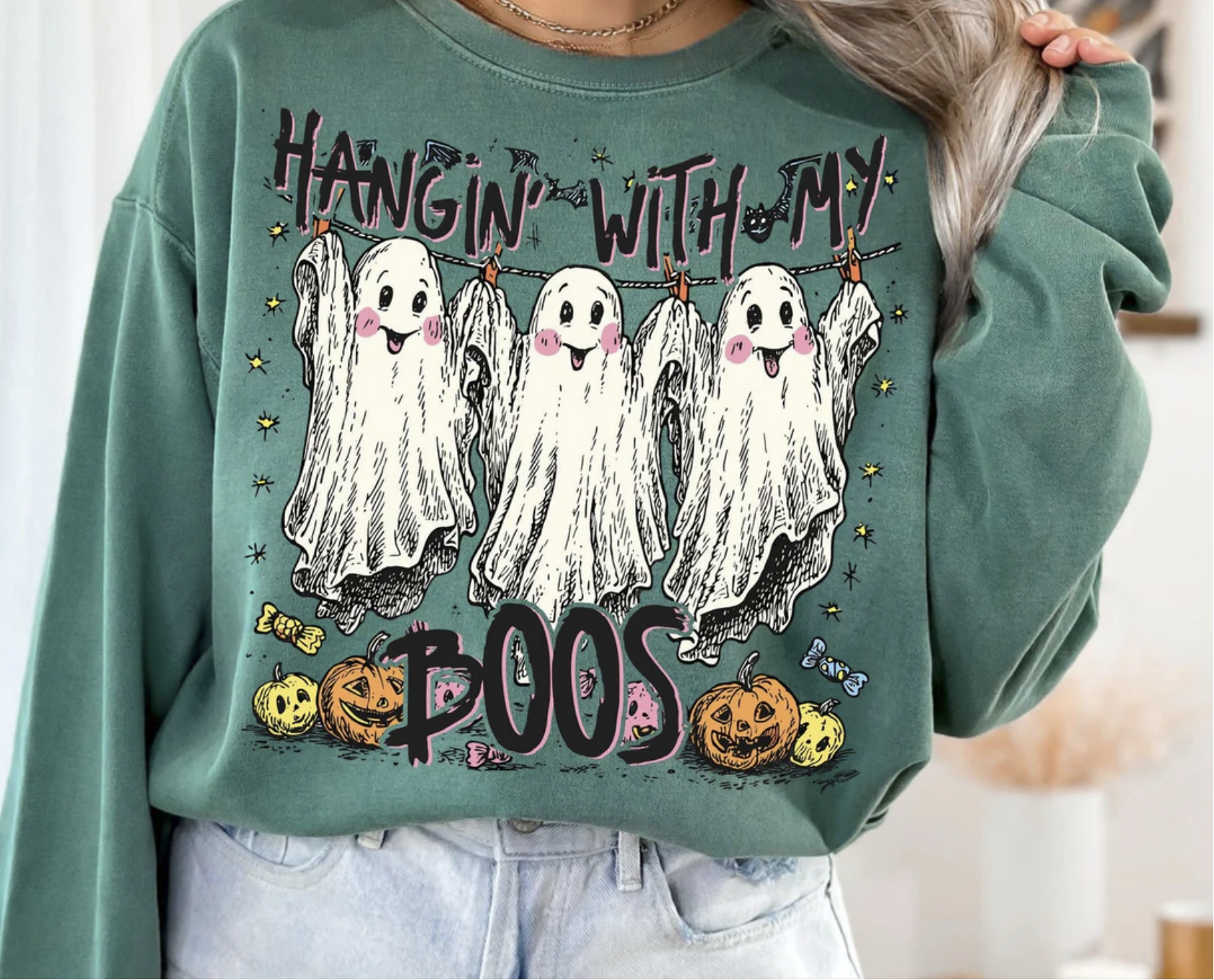 "Hangin’ With My Boos Halloween ghost graphic t-shirt"

"Cute spooky season sweatshirt with candy and pumpkin design"

"Funny Halloween ghost friends graphic sweatshirt"