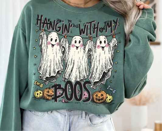 "Hangin’ With My Boos Halloween ghost graphic t-shirt"

"Cute spooky season sweatshirt with candy and pumpkin design"

"Funny Halloween ghost friends graphic sweatshirt"