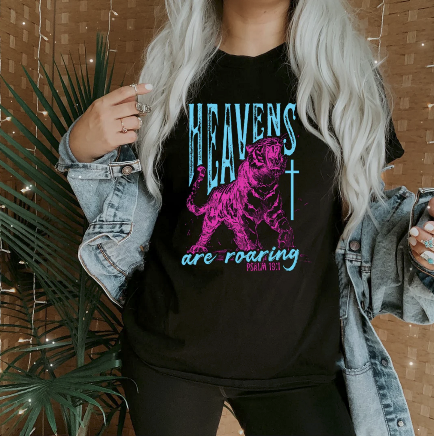 Black shirt with neon tiger graphic and “Heavens Are Roaring Psalm 19:1” text