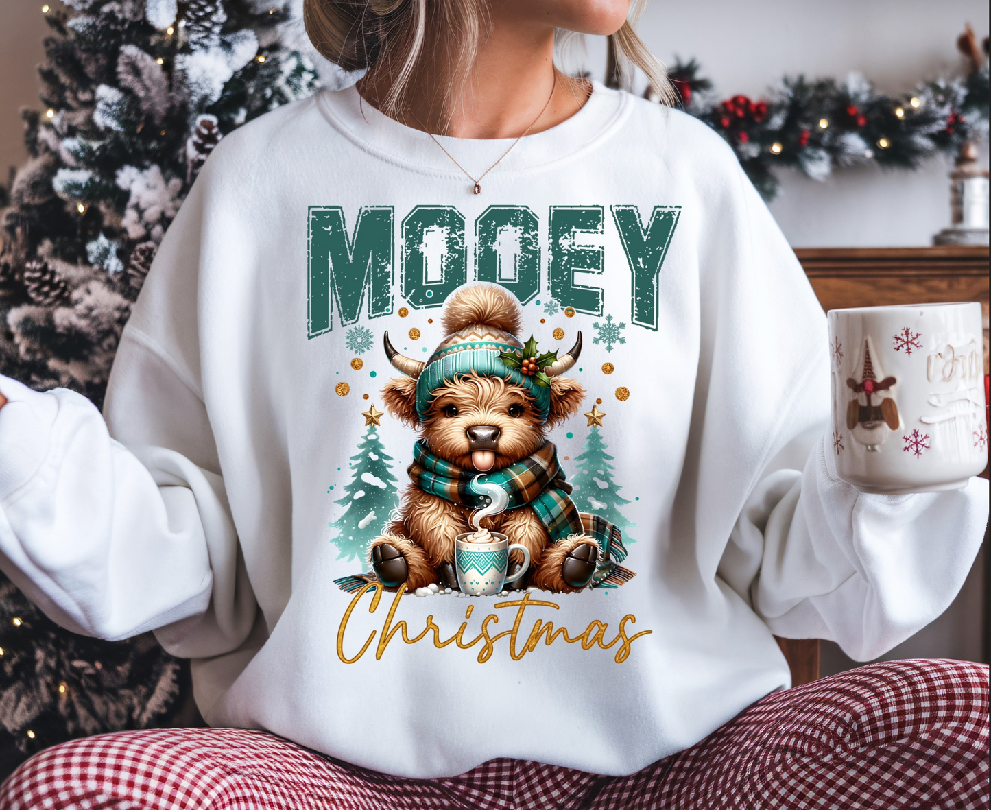 Woman wearing Mooey Christmas sweatshirt, cute cow holiday pullover