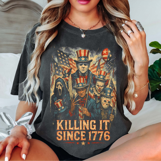 Killing It Since 1776 graphic tee with Uncle Sam and horror characters in distressed patriotic design
