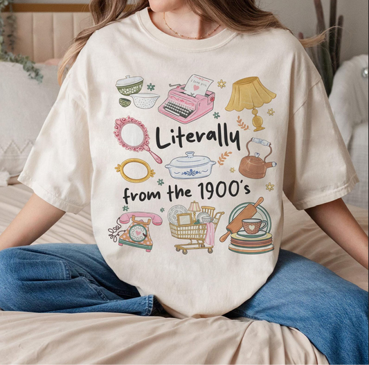 Cream graphic t-shirt featuring Literally From the 1900’s text with cute vintage illustrations like typewriter, phone, and kitchenware for retro boutique fashion