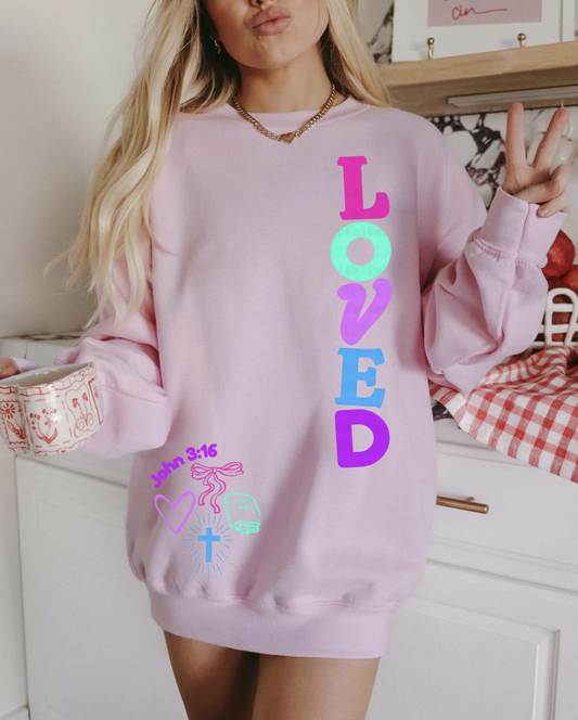 LOVED John 3:16 Christian Sweatshirt – pastel pink pullover with colorful faith lettering and cross design