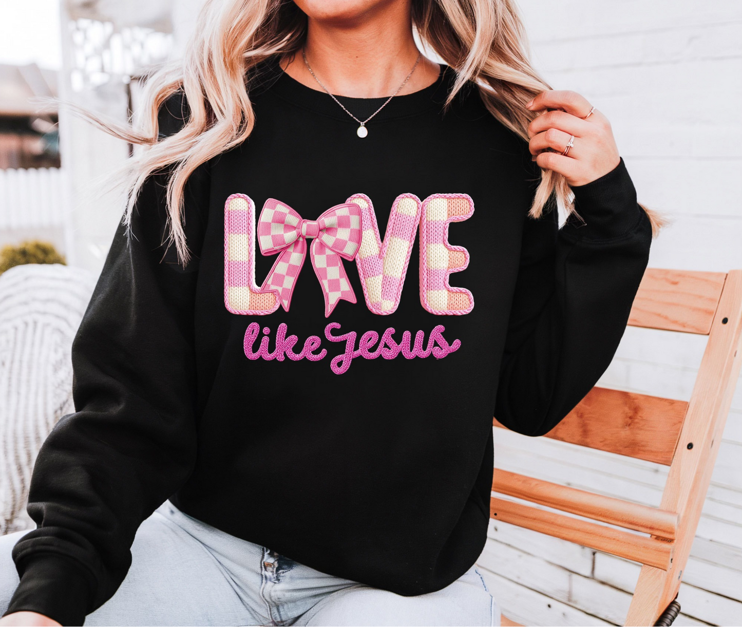 Black Love Like Jesus graphic sweatshirt with pink lettering and bow design