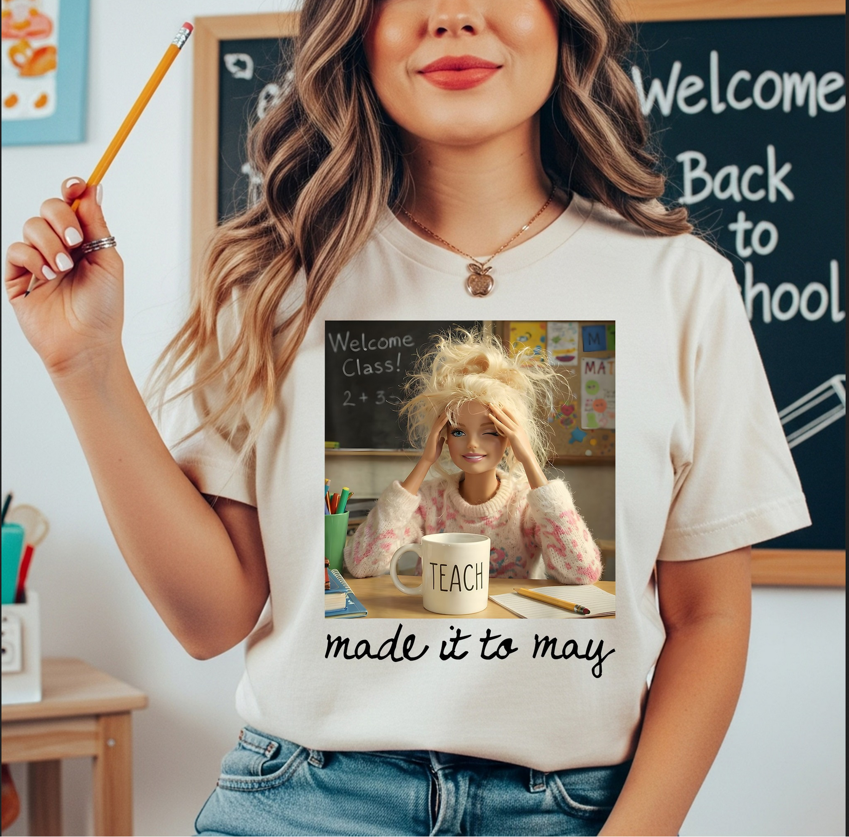 Cream graphic t-shirt featuring teacher design with Made it to May phrase and classroom theme for end of school year outfit