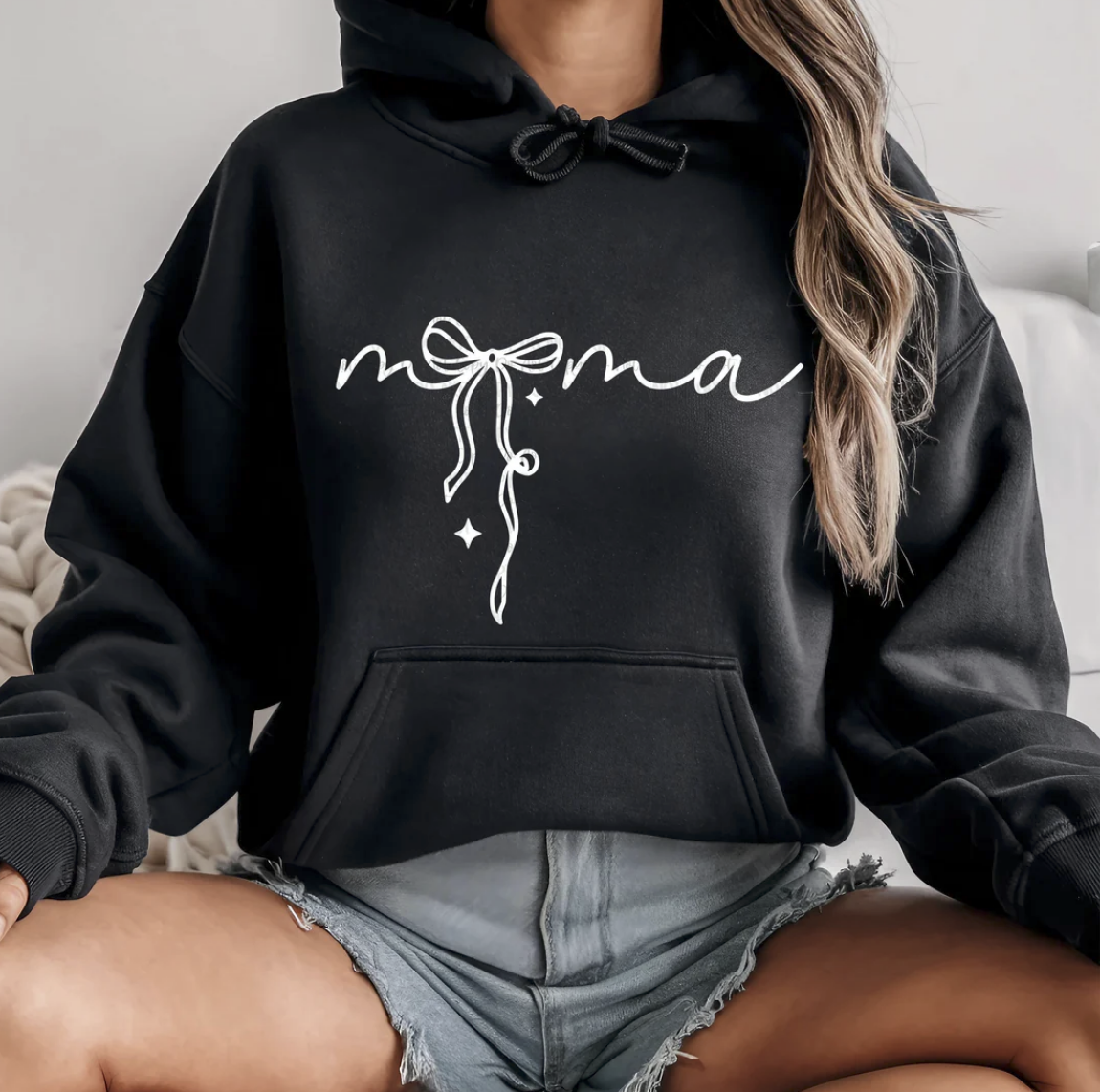 Black t-shirt with white script “Mama” and bow graphic – minimalist mom life tee
