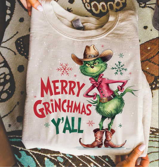 Merry Grinchmas Y’all shirt – festive Christmas t-shirt with Grinch graphic

Funny Merry Grinchmas Y’all holiday tee – unisex cotton shirt in white

Christmas Grinch shirt with “Merry Grinchmas Y’all” text – soft holiday top

Close-up of Merry Grinchmas Y’all design – green Grinch graphic print

Merry Grinchmas Y’all t-shirt styled with jeans and Christmas accessories

Humorous holiday shirt – Merry Grinchmas Y’all cotton tee for festive season