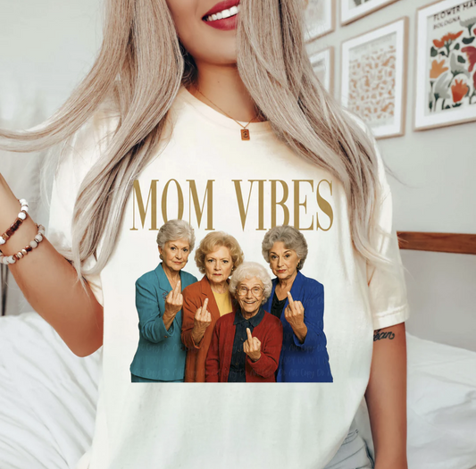 Mom Vibes graphic tee with retro women and funny attitude design on beige shirt
