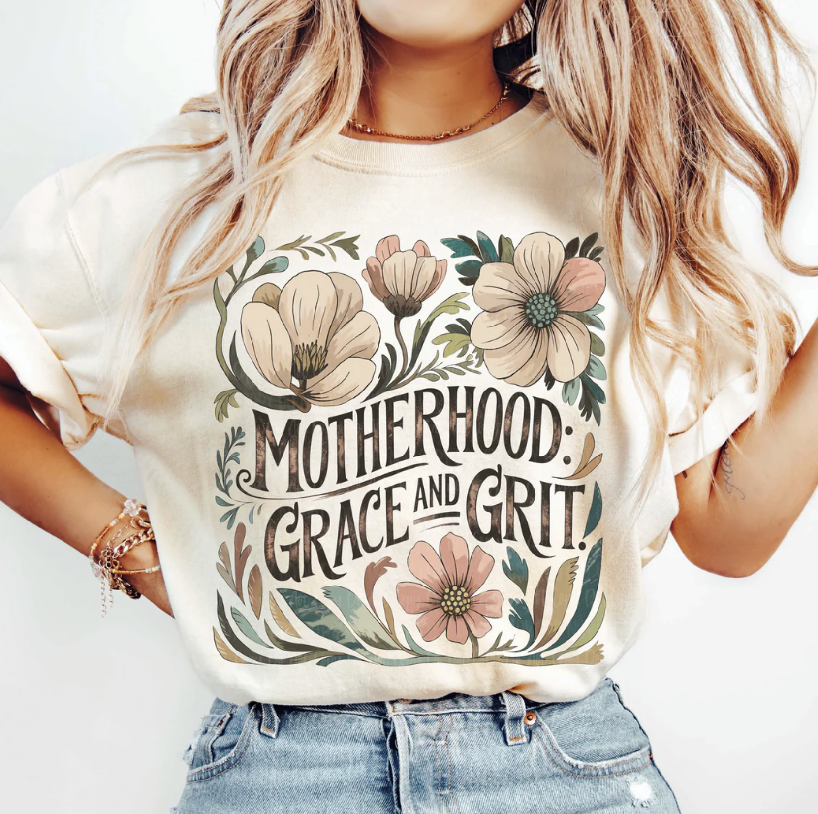 Motherhood Grace and Grit graphic tee with vintage floral artwork on beige shirt
