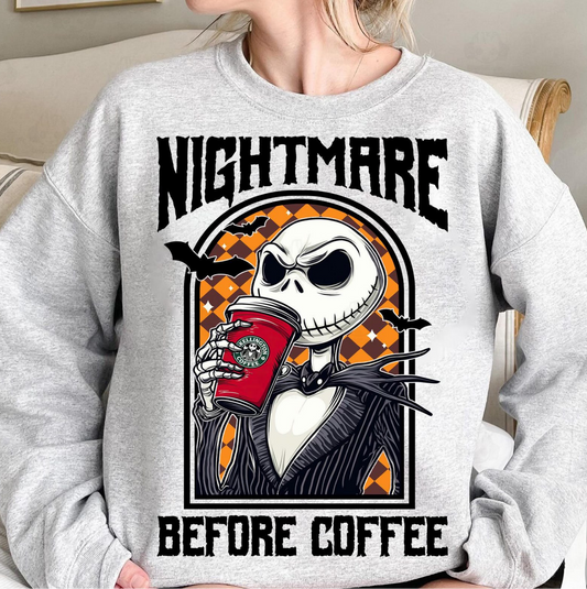 Woman wearing gray sweatshirt with Nightmare Before Coffee graphic featuring Jack Skellington holding a coffee cup – Halloween pullover
