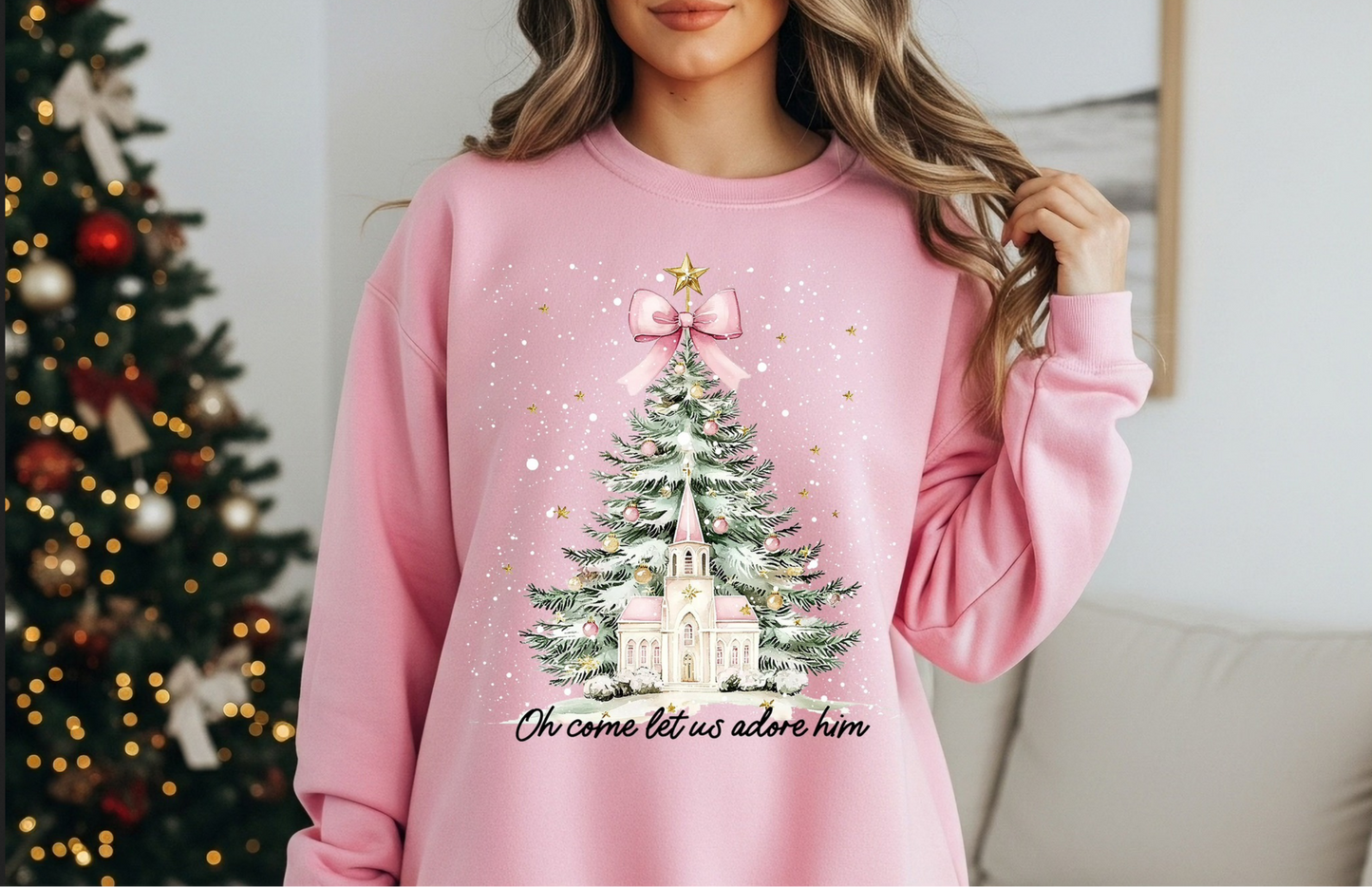 Pink Christmas sweatshirt with tree and chapel that says Oh come let us adore Him
Faith-based holiday sweatshirt in pink
Cozy unisex Christmas crewneck with chapel design