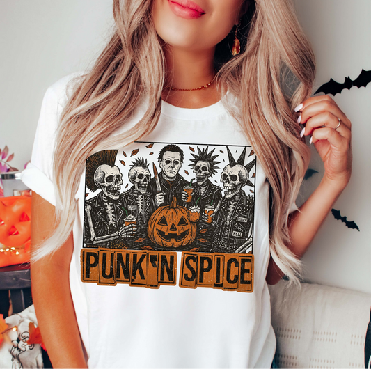"Halloween punk graphic t-shirt with skeletons, pumpkin, and Punk ’N Spice text"

"White unisex punk rock Halloween tee with spooky skeletons and pumpkin design"