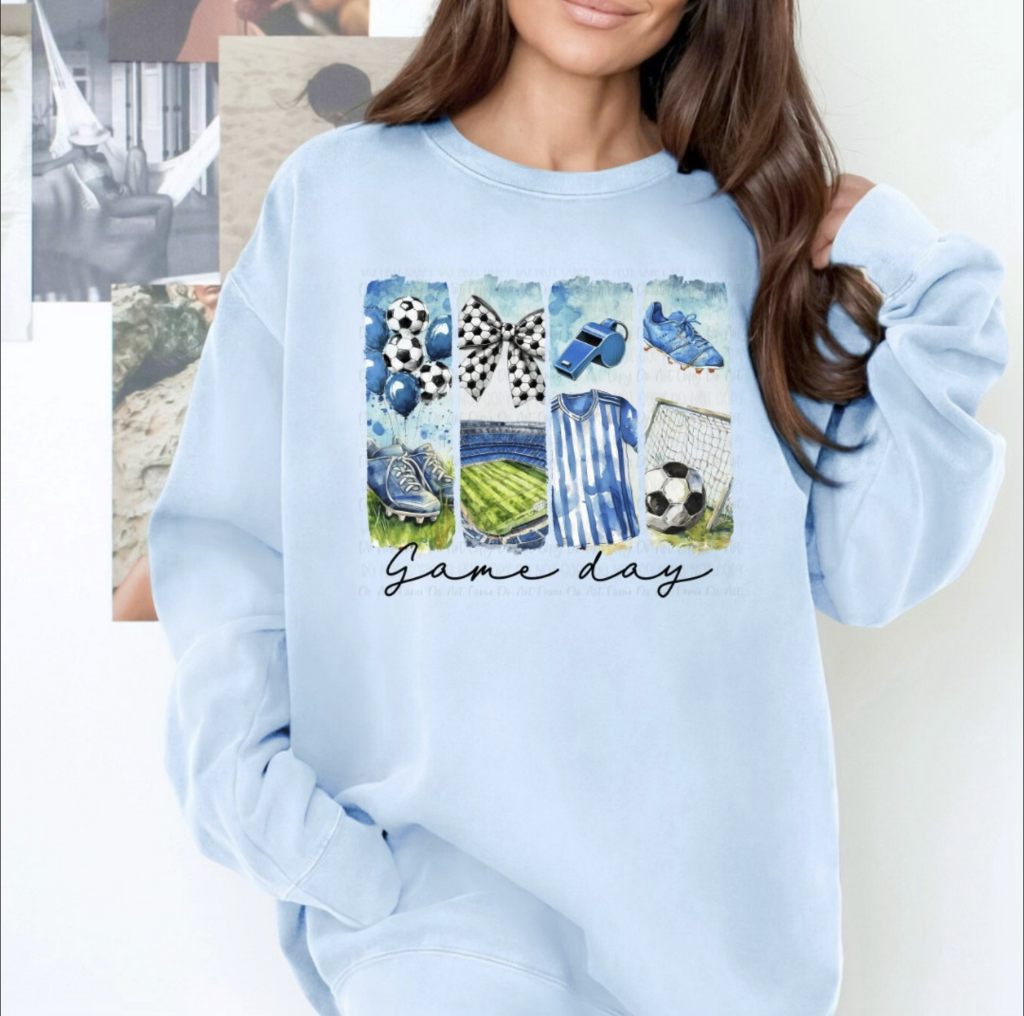 Light blue unisex sweatshirt with soccer-themed graphic panels and script text that reads ‘Game Day.
