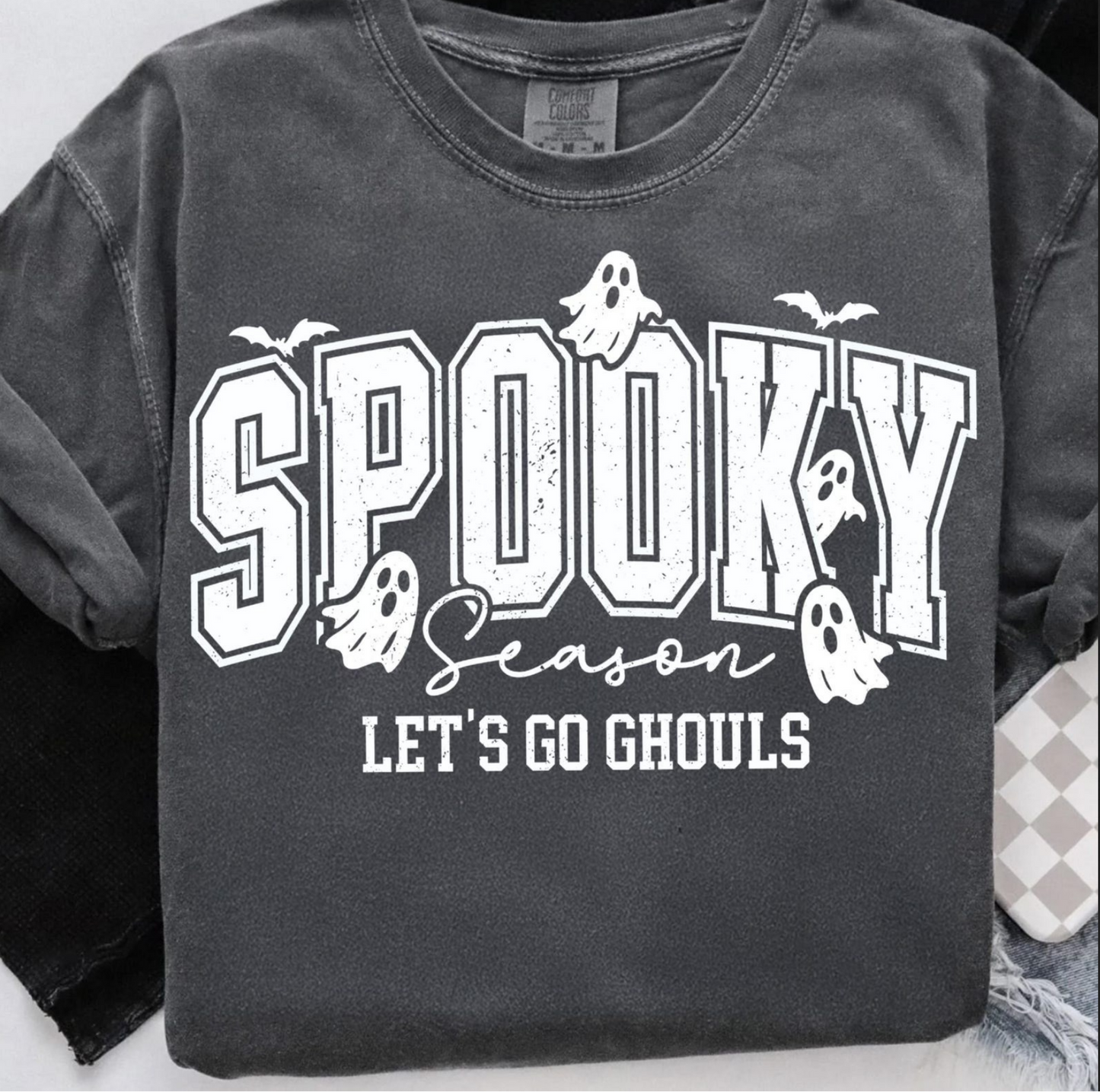 Spooky Season Let’s Go Ghouls Halloween Sweatshirt – varsity-style black pullover with ghost graphic