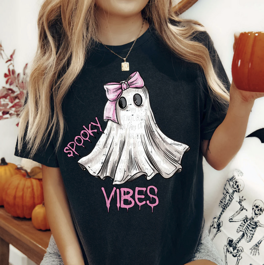 Spooky Vibes ghost graphic tee with pink bow and lettering on black shirt
