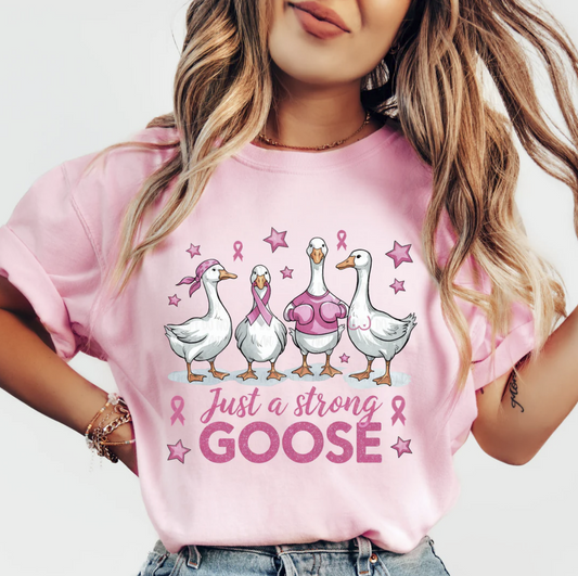 "Pink graphic t-shirt with geese and pink ribbons – Just a Strong Goose Breast Cancer Awareness Shirt"

"Funny unisex breast cancer support tee with goose design in pink, white, or beige"