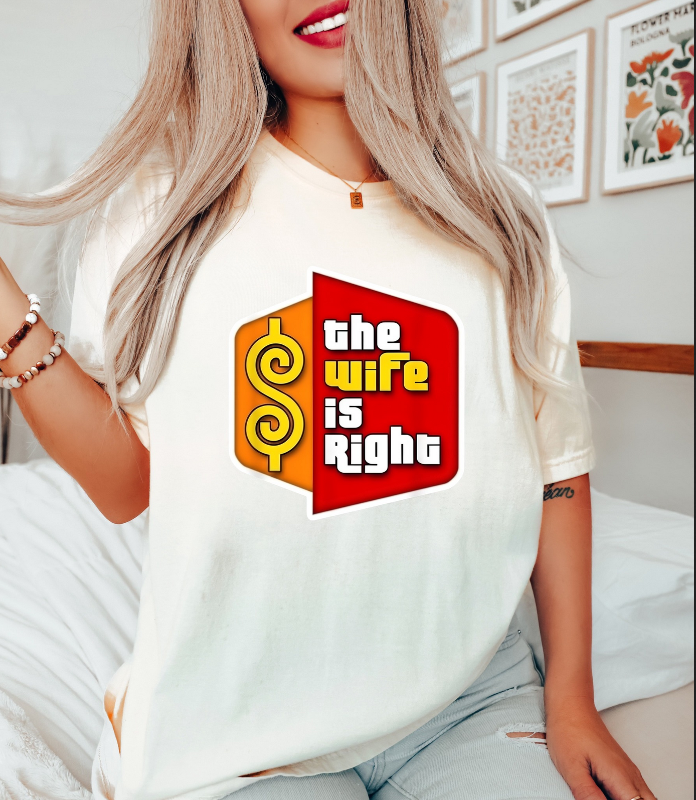 Retro-style graphic tee with the phrase ‘The Wife Is Right’ printed in bold colors on a cream shirt.