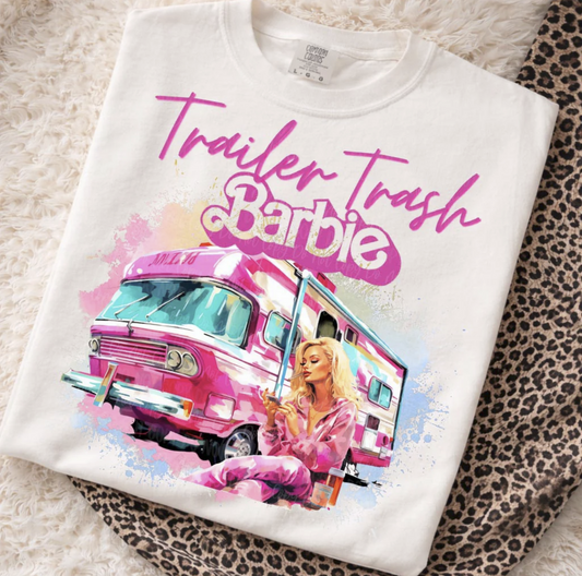 White shirt with pink camper and woman graphic with trailer trash doll text