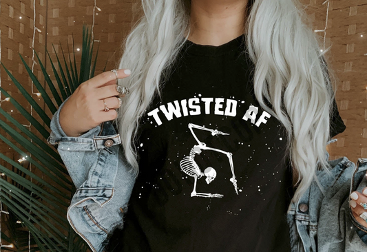Black t-shirt with white skeleton graphic in twisted pose and text “Twisted AF” – funny Halloween shirt