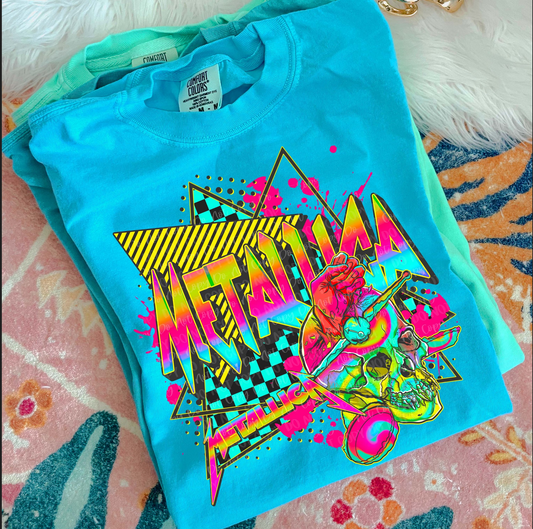 Metallica neon retro graphic tee in blue with skull and bold logo design