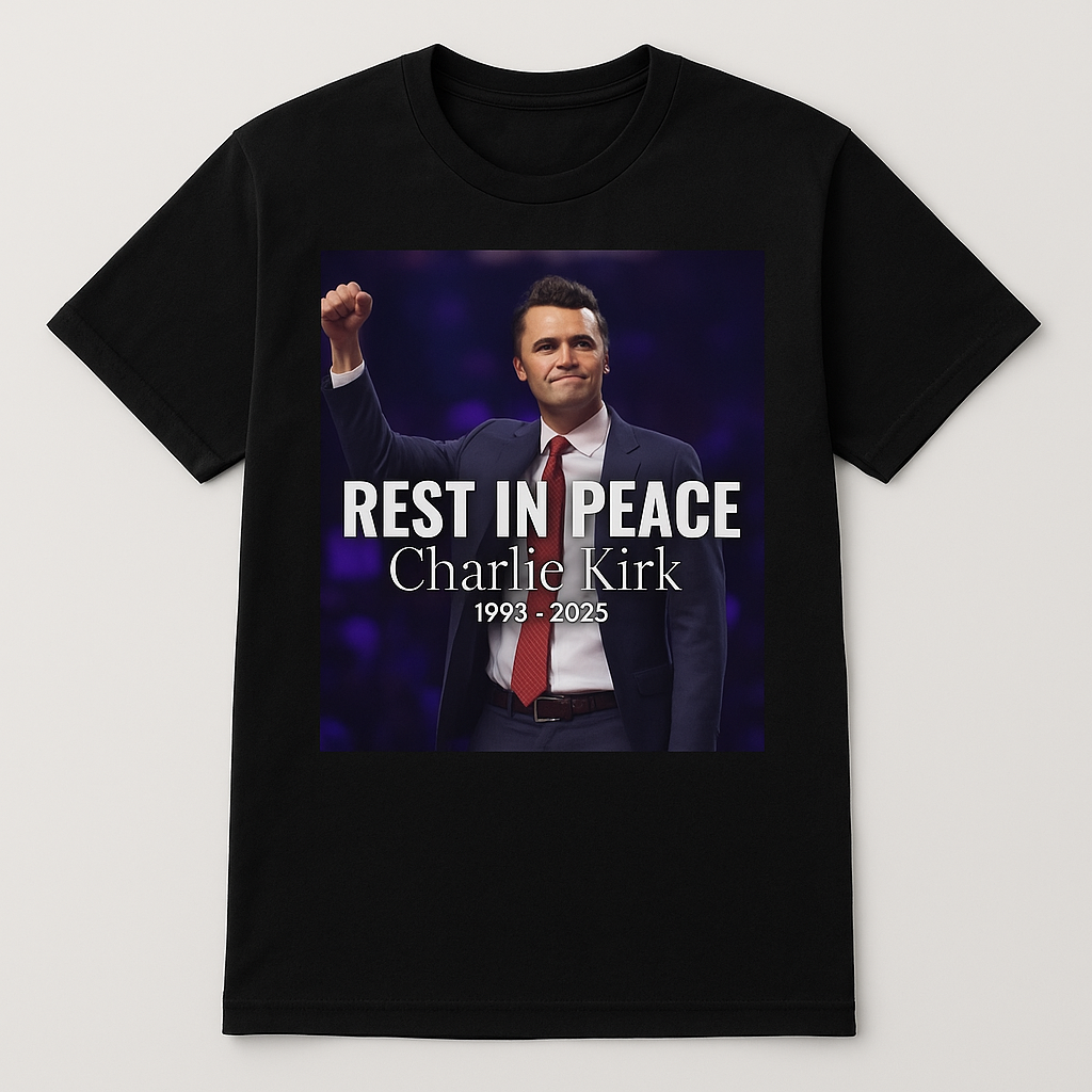 Black T-shirt with full-front print reading Rest in Peace Charlie Kirk 1993–2025.